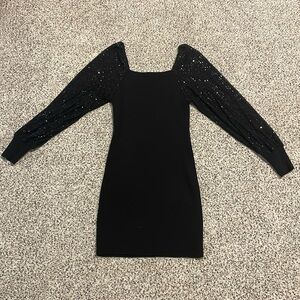 L black sweater dress with sequin sleeves
